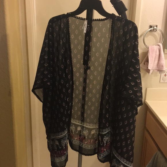 Tops - Kimono see thru never worn!